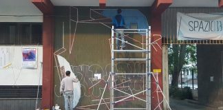 intervento di street art in corso a spazio 13